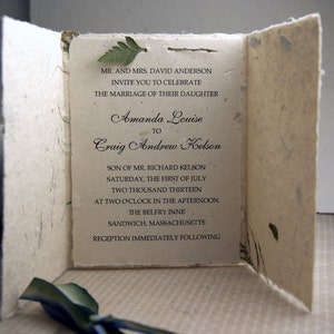 Seed Paper Invitation custom printed in black ink with hand dyed silk ribbon bow and leather fern