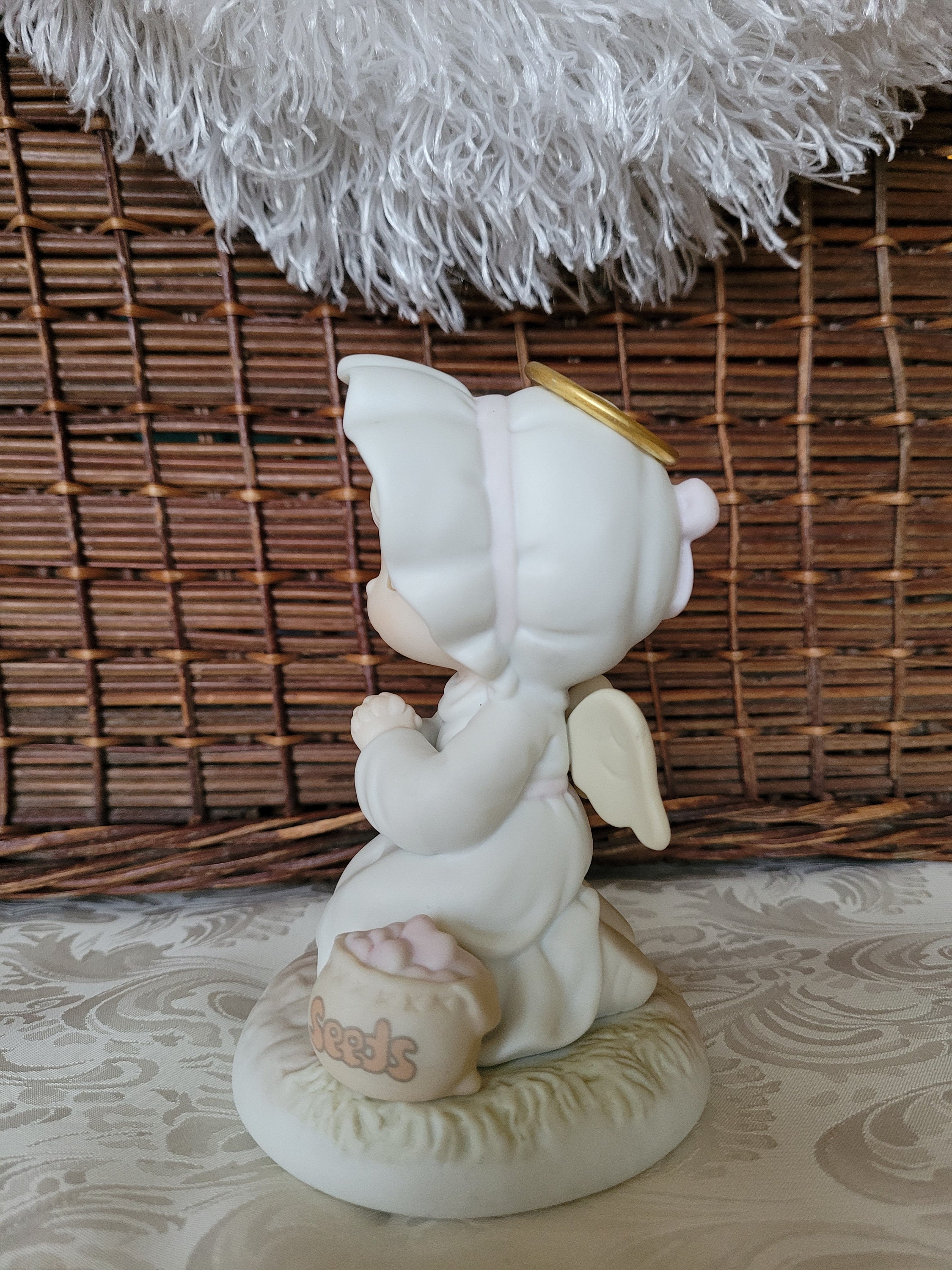 プレシャス・モーメンツ「優しさの種まき」磁器製天使の置物（1995年