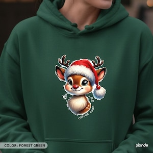 Christmas Reindeer Hoodie | Custom Name | Cute Baby Deer | Santa Hat | Holiday Gift | Festive Sweatshirt | Kids Adults | Xmas Hoodie Gift