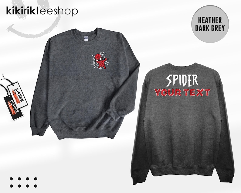 May include: A heather dark grey crewneck sweatshirt featuring a small red and blue spider-themed character graphic on the front left chest. The back displays the white text SPIDER above the red text YOUR TEXT in a stylized font.