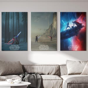 May include: Three Star Wars canvas prints featuring characters with lightsabers. The prints showcase scenes with characters in action, set against snowy forests, desert landscapes, and a dramatic sky. The Star Wars logo is at the bottom of each print.