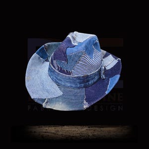 May include: A blue denim cowboy hat made from patchwork fabric. The hat has a wide brim and a crown that is slightly pointed. The hat is made from a variety of different shades of blue denim, and the seams are visible. The hat is a unique and stylish accessory that would be perfect for a casual or western outfit.