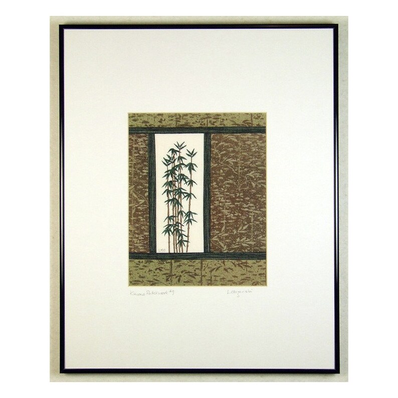May include: A framed print of a Japanese woodblock print depicting a stylised bamboo plant in a window frame. The print is in shades of green, brown, and white.