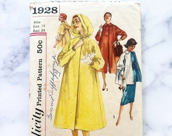 50s Simplicity 1928. 34 bust retro oversized long cape hooded jacket coat. raglan sleeves short topper car coat 1950s vintage sewing pattern