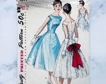 50s Simplicity 1677. 34 bust. fit flare gore skirt princess cocktail dress with bow trim. boatneck party dress 1950s vintage sewing pattern