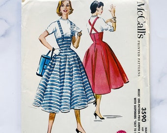 50s McCalls 3590. 26 waist uncut ff. mod retro high waist pinafore cross strap button suspender jumper dress. 1950s vintage sewing pattern
