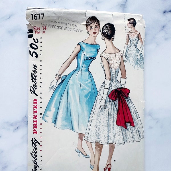 50s Simplicity 1677. 34 bust. fit flare gore skirt princess cocktail dress with bow trim. boatneck party dress 1950s vintage sewing pattern