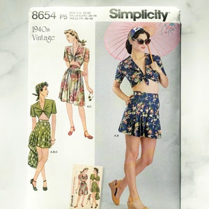 May include: Simplicity sewing pattern number 8654, size 12-20, for a 1940s vintage style outfit. The pattern includes a cropped top with a tie front and a skirt with a gathered ruffle. The model is wearing a floral print fabric and a headband. The pattern is designed and printed in the USA.