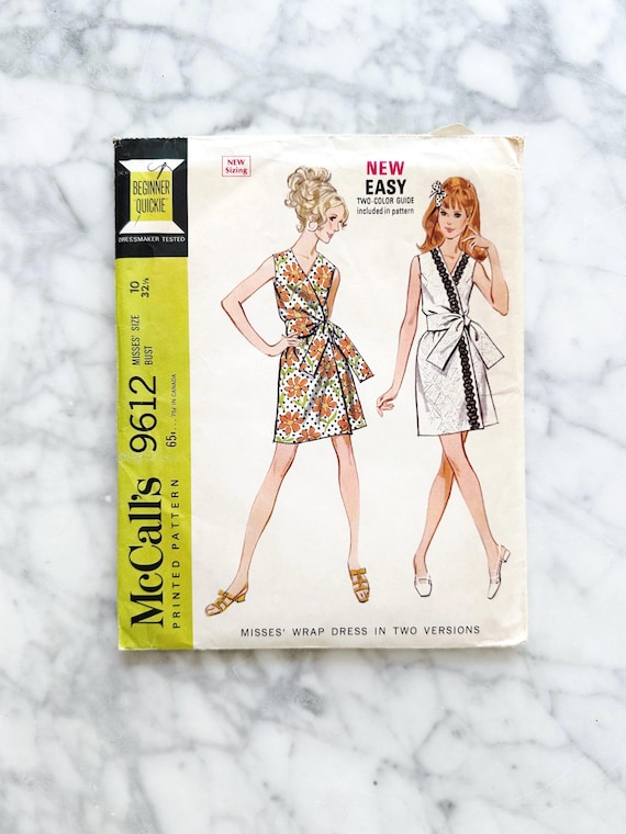 retro wrap dress pattern McCall’s 9612 – Bust 32.5. 1960s mod sleeveless wrap dress in two versions.  Easy beginner style. Retro vintage sewing pattern