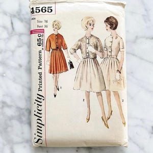 May include: Vintage Simplicity sewing pattern number 1565 for a dress with a matching jacket. The pattern is for size 16, bust 36 inches. The pattern shows three women wearing the dress and jacket in different colors.