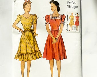 Simplicity S9464. 6-14, 16-24. uncut ff new. Puff sleeve sweetheart neckline tiered ruffle skirt dress. 1940s vintage sewing pattern reissue