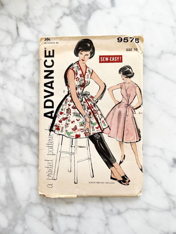60s Advance 9575. 32.5 bust ff. collarless wrap front apron dress. tie side  front sleeveless fit flare dress. 1960s Vintage Sewing Pattern