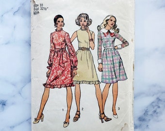 70s Simplicity 5008 32.5 bust. mod retro dress with ruffle tier skirt. long sleeves round collar. doll dress. 1970s vintage sewing pattern