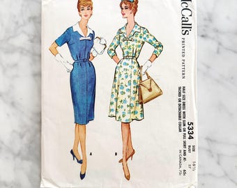McCalls 5334 – Bust 37. 1960s half size day dress. Fitted waist full skirt styling. Vintage sewing pattern.