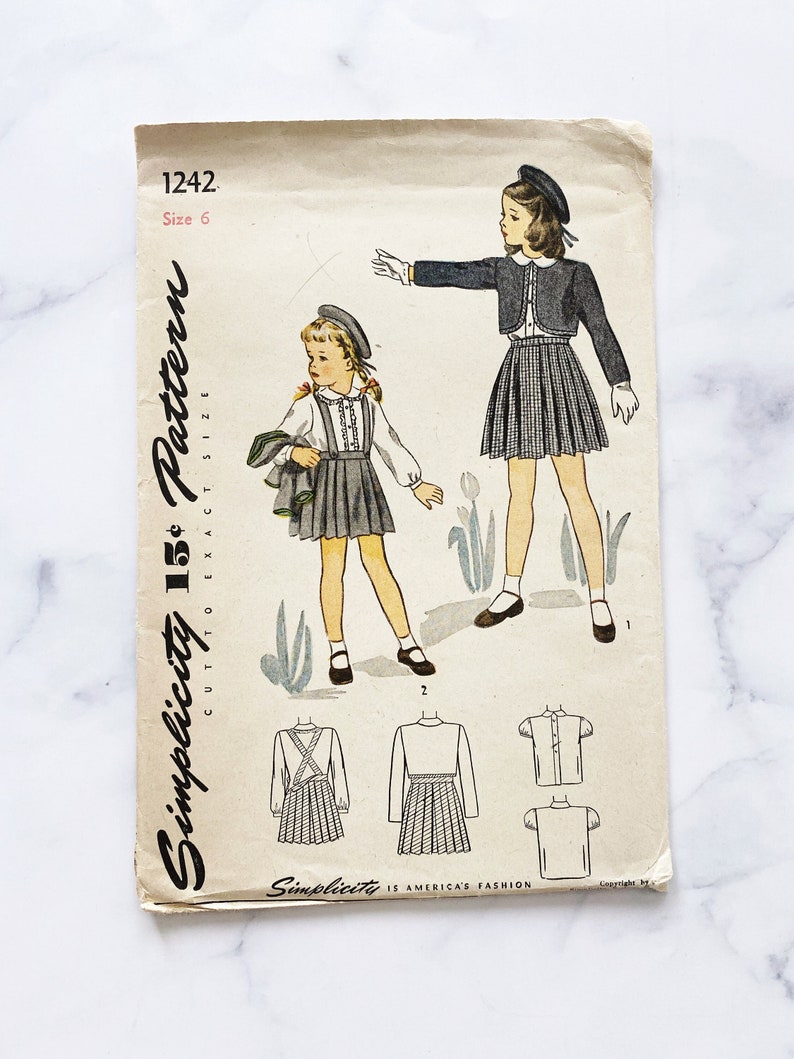 50s Simplicity 1242. Size 6. girls pleated skirt suspenders. cropped bolero jacket round collar shirt blouse 1950s Vintage Sewing Pattern. image 1