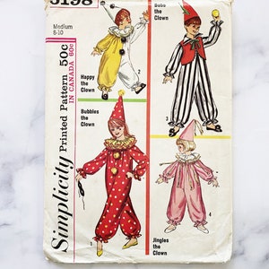 May include: Vintage Simplicity sewing pattern number 6198 for making four different clown costumes. The pattern is for sizes 8-10 and includes instructions for making a yellow, red, pink, and black and white clown costume.