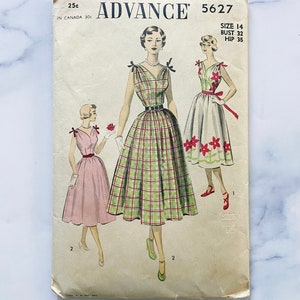 50s Advance 5627. 32 bust. tie shoulder bows v neck border print fit and flare dress + full gathered skirt. 1950s vintage Sewing Pattern