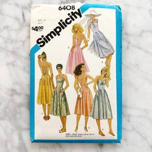 80s Simplicity 6408. 32.5 bust. apron cross back straps cottage core full gathered skirt sun dress + pockets. 1980s vintage sewing pattern