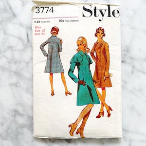 May include: Vintage Style sewing pattern featuring illustrations of women's coats. The pattern packet is white with the number 3774 and the word "Style" printed on it. The pattern includes sizing information for Misses size 12 and Bust 34.