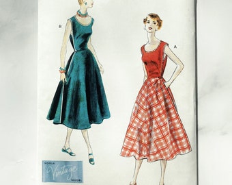 Vogue 1864 8-16 or 16-24 uncut ff new. 1950s retro apron fit and flare wrap dress. 50s vintage sewing pattern reissue