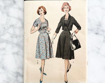 Advance 9060 – Bust 43. 1950s plus size  fit and flare dress + jacket set with square neckline. Vintage sewing pattern.