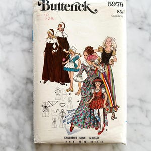 70s Butterick 5979. 32 bust ff. Pilgrim colonial costume prairie dress. corset lace up puff sleeve bodice. 1970s Vintage Sewing Pattern