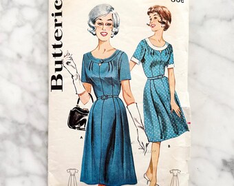 60s Butterick 9796. 34 bust. scoop cut out front tab neckline fit flare dress. short sleeves pleated knee skirt 1960s Vintage Sewing Pattern