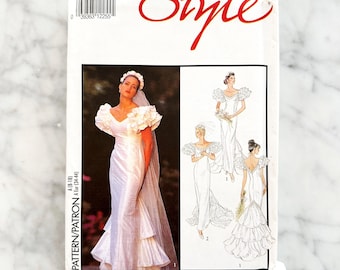 Style 2065 – Size 8-18. 1990s bridal mermaid wedding gown with dramatic ruffled sleeves. Vintage sewing pattern.