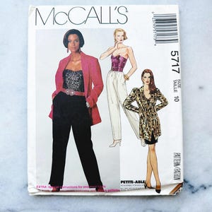 May include: McCall's sewing pattern envelope for a women's outfit. The pattern is for size 10 and includes a jacket, top, and pants. The envelope features three models wearing the outfit.