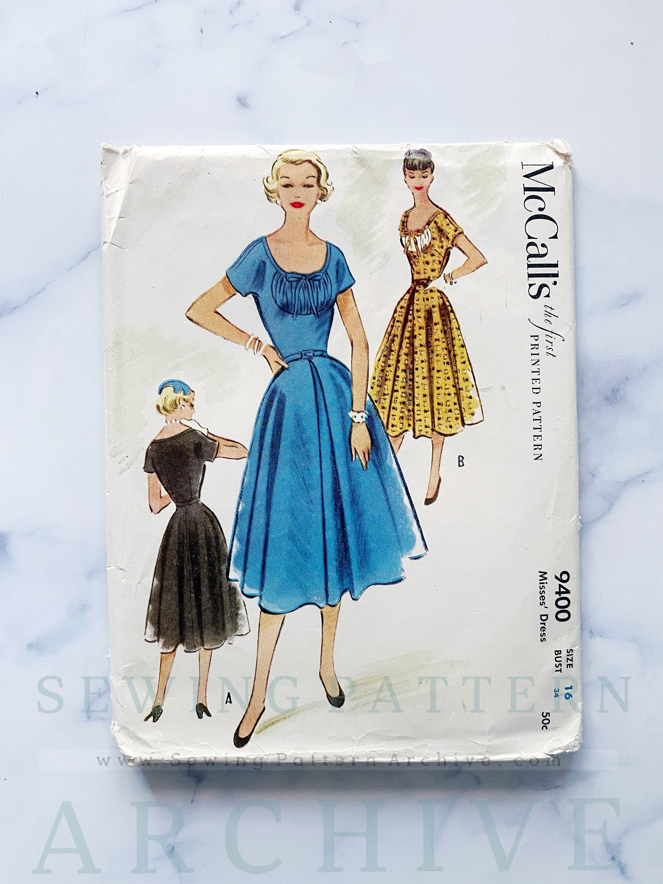 50s McCalls 9400. 34 bust uncut ff. gathered inset bust pinup retro rockabilly full flare skirt cocktail dress. 1950s vintage sewing pattern 50s McCalls 9400. 34 bust uncut ff. gathered inset bust pinup retro rockabilly full flare skirt cocktail dress. 1950s vintage sewing pattern