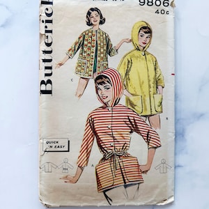 May include: Vintage sewing pattern for a hooded jacket with a striped design. The pattern is for sizes 10-12 and is labelled "9806 40c".