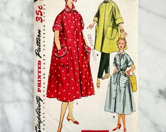 50s Simplicity 4471. 30 bust. retro wide swing robe house dress coat. tie waist belt patch pockets 1950s Vintage Sewing Pattern
