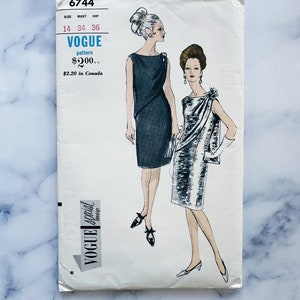 60s Vogue 6744. 34 bust uncut ff. Asymmetrical one shoulder draped front wrap bodice sheath cocktail dress. 1960s vintage sewing pattern