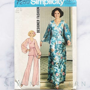 May include: Simplicity sewing pattern number 7259 for a designer fashion dress and pants. The pattern is for size 14, bust 36 inches, and is for misses. The pattern shows two models wearing the designs. One model is wearing a blue and white floral print dress with long sleeves and a sash. The other model is wearing a pink pantsuit with long sleeves and a sash.