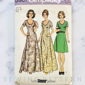 May include: Vintage Simplicity sewing pattern number 5967 for a dress. The pattern is for a size 14, bust 36 inches, and is for a miss. The pattern shows three different styles of dresses, one with a floral print, one with a solid gold fabric, and one with a solid green fabric. The pattern is titled "Look Slimmer" and is from the Sewing Pattern Archive.