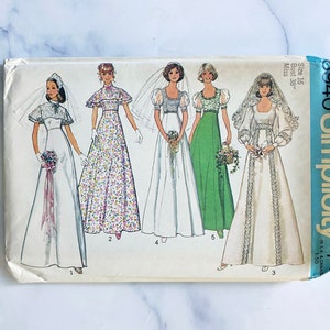 Simplicity 6940 – Bust 36, 38. 70s wedding bridal or prom dress. Empire waist gowns with puff sleeves. Vintage sewing pattern.