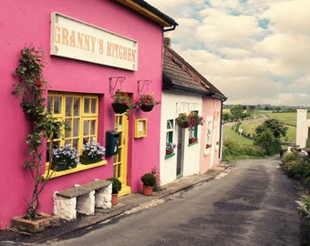 Ireland Photography - Cashel pink building Granny's Kitchen small town road side green landscape tourist attraction blue green yellow