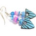 see more listings in the Fiber bead earrings section