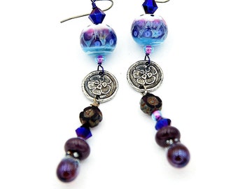 NEW! Long Bohemian Dangle Earrings. Colorful Purple Lampwork Beads. Small Handmade Inviciti Flower Charms. Boho Hippie Beaded Jewelry.