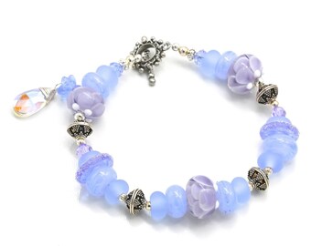 Lavendel lampwork kraal stapelarmband. SS zilveren Bali-sluiting. Statement sieraden.