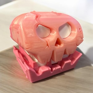 Scatola portaoggetti a forma di teschio stampata in 3D per schede di gioco Nintendo Switch: creativa e pratica, ideale per i giocatori
