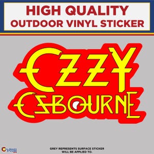 May include: A red and yellow vinyl sticker featuring the name "OZZY OSBOURNE" in a stylized font. The sticker has the text "HIGH QUALITY OUTDOOR VINYL STICKER" at the top. The grey area represents the surface the sticker will be applied to.