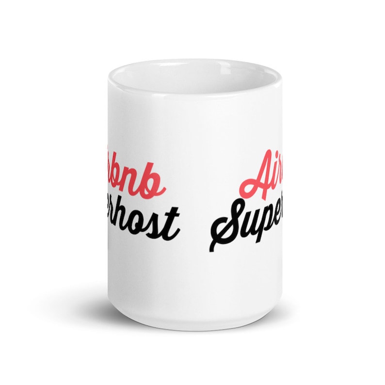 May include: White ceramic mug with black text that reads "Airbnb Superhost" and red text that reads "Air Super".
