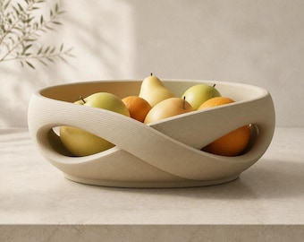 Moderne Obstschale Infinita mit Infinity-Design – Skulpturale Dekoschale in vier Farben