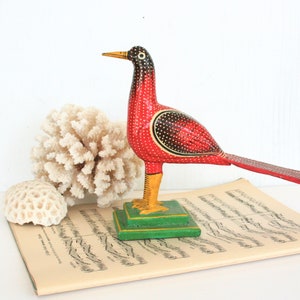 Primitive carved wood bird figurine. Painted lightweight wood, folk art, Made in India, shelf sitter, hand painted, red, green, yellow, dots