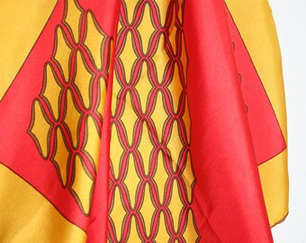 Silk scarf by Saks Fifth Avenue. Yellow, red, geometric. Italy, diamonds, pattern.