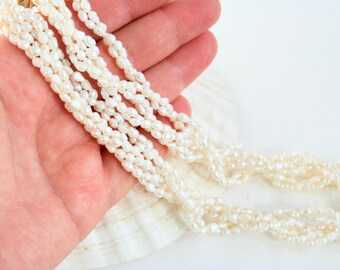 Vintage rice pearl multi strand necklace. Twisted, collar, artisan, classic statement necklace, traditional, white, boho wedding