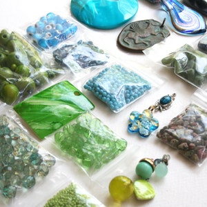 27 Bundle of jewelry making supplies, green supply lot, destash. Beads, findings, glass, plastic, shell, art glass, one and half pounds