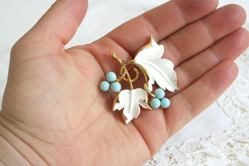 metal floral blue spring Sarah Coventry vintage enamel brooch white Mid century retro baby blue grapes berries leaves summer