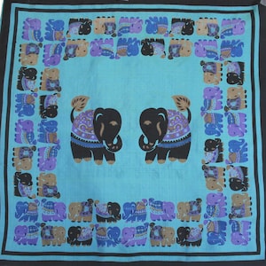 Thai silk neckerchief or pocket square with elephant motif. Hand screened scarf, hand printed, block print, blue, teal, purple, black, tan